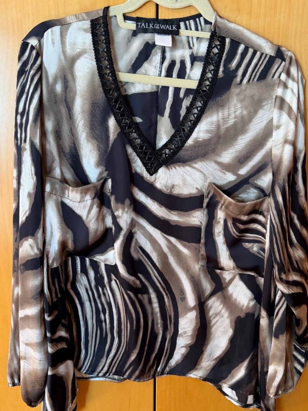 Talk of the Walk Animal Print V-Neck with lace trim detail